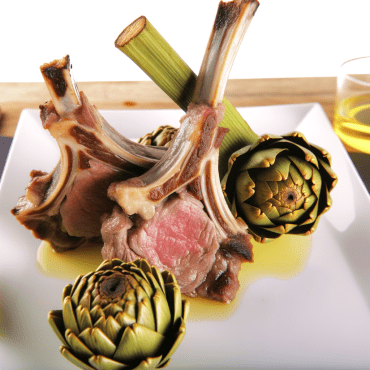 Lamb chops with artichokes is a traditional dish perfect to celebrate Easter with rich and balanced flavors. The lamb slices are seasoned with prosciutto, artichokes, onion, garlic, rosemary, and white wine for a tasty outcome. A crunchy twist of toasted pine nuts adds originality to this Easter delicacy.