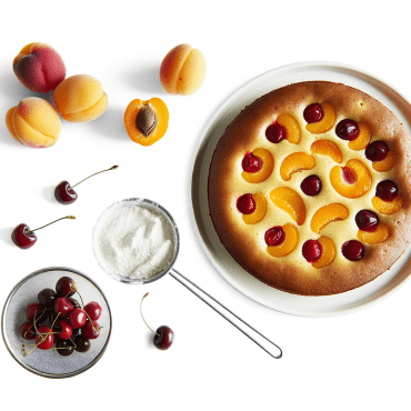 Recipe for Apricot and Cherry Tart, a summer delight with a crisp pastry base, almond whipped cream, and syrupy fruit. A refreshing and indulgent dessert, perfect for summer!